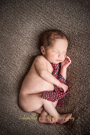 Baby boy sleeping with tie