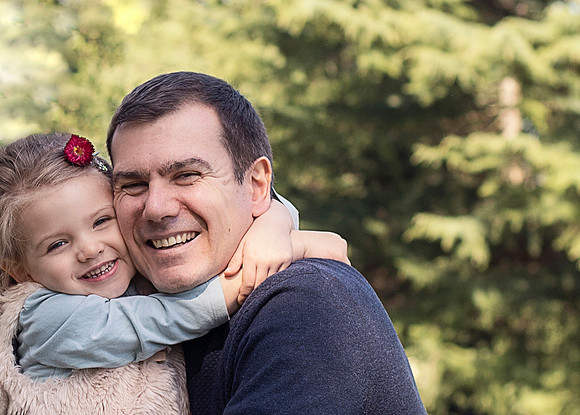 Father and daughter hug